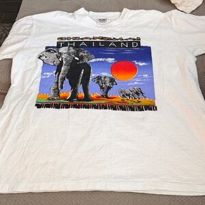 2 vintage Thailand single stitch  tahirts. One is new old stock in package.